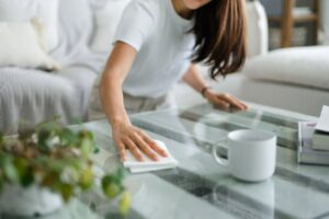 wiping up a mess on the kitchen counter