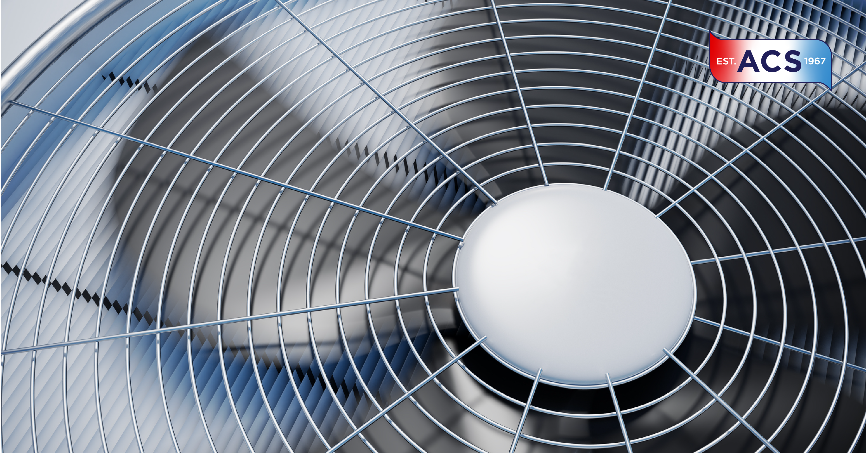 A close-up of the propeller of a moving air conditioning unit