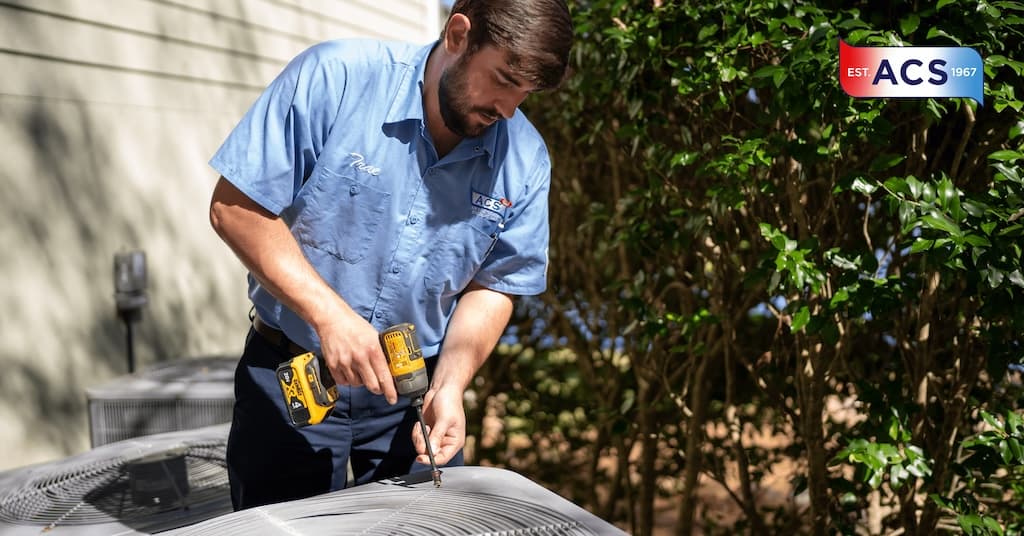 HVAC specialist shaking hands with customer